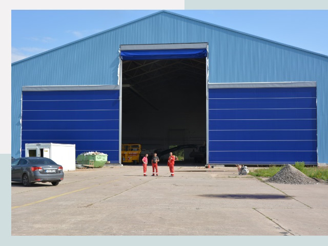 Ангарные ворота в Муравленко от СтальСтрой-Мрв по цене 642 руб.